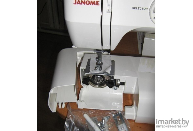 Швейная машина Janome LW 20